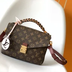 Louis Vuitton braided Pochette Métis crossbody bag in monogram canvas with braided top handle and gold-tone hardware