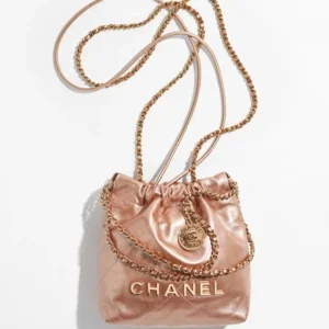 Chanel 22 Mini Handbag pink gold metallic quilted leather with chain strap and Chanel logo