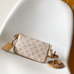 Louis Vuitton Pochette Accessoires NM in Monogram Origine canvas with gold zipper and leather strap